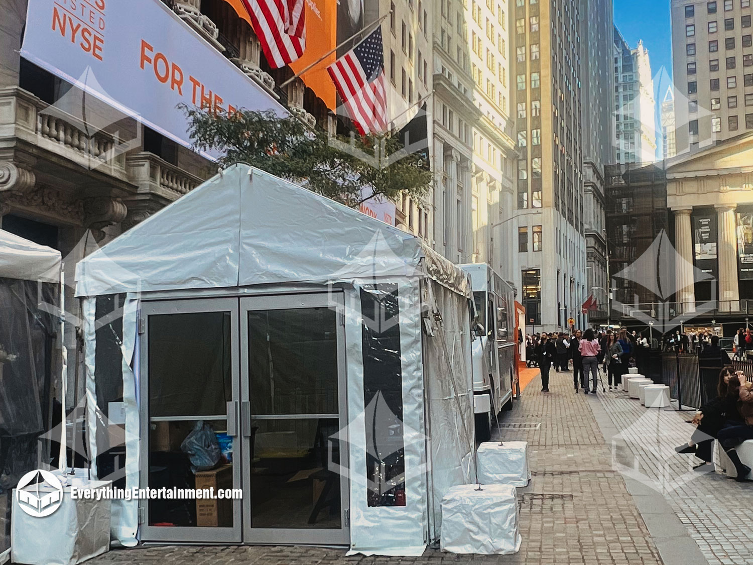 10x10-white-frame-tent-rental-setup A professional 10x10 white frame tent setup for an event at the NY Stock Exchange