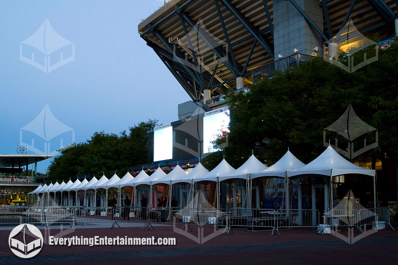 many 10x10 high peaks in long line Multiple 10x10 high peak marquee tents in row setup in queens for event registration