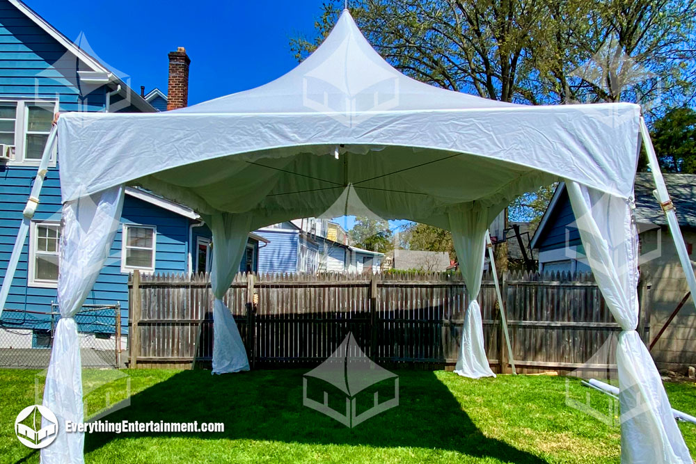 15x15 high peak marquee tent with fabric drape 15x15 high peak marquee tent in NJ backyard with leg and ceiling drape