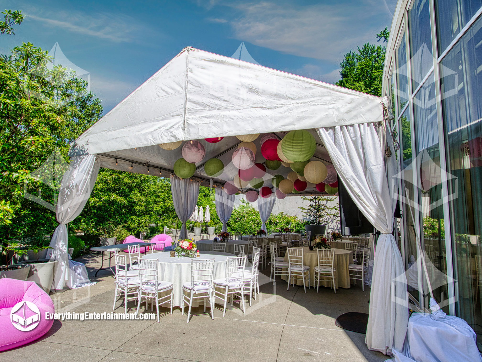 20x40-frame-tent-backyard 20x40 Frame tent plus high-peak tent setup in backyard with blue cloudy sky