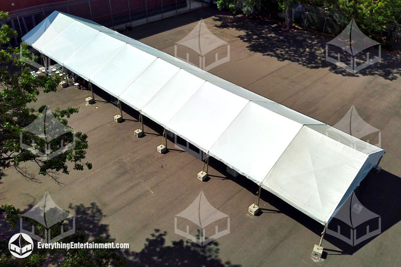 30x125 foot frame tent 30x125 foot frame tent setup on grass