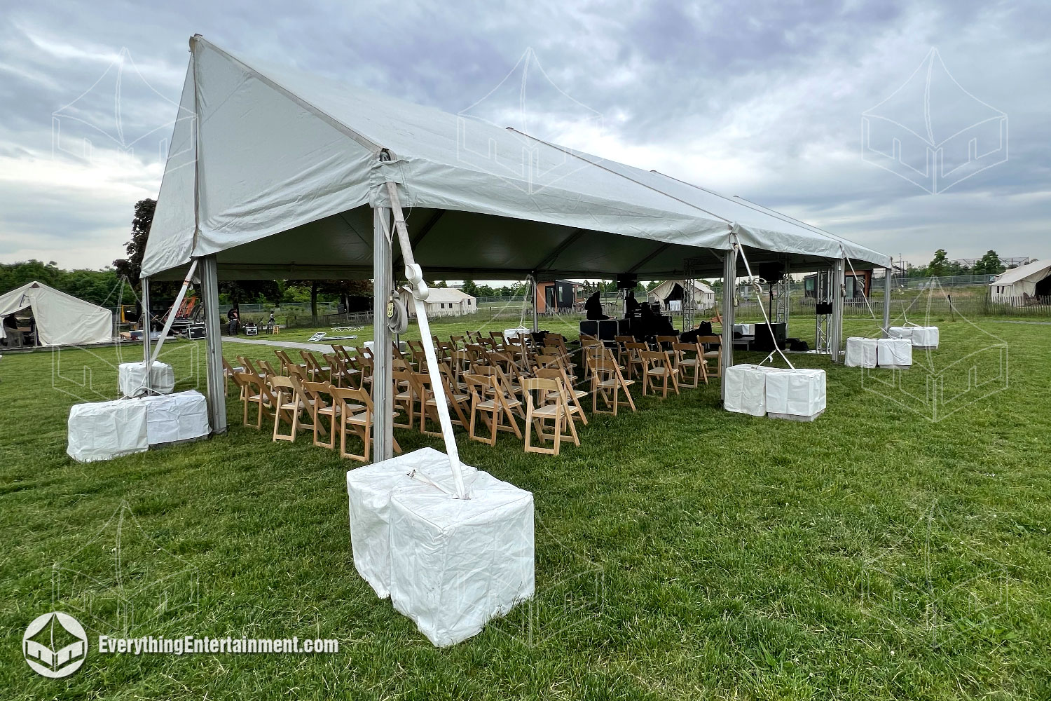 30x45-foot-frame-tent 30x45 foot frame tent setup on grass on Governors Island
