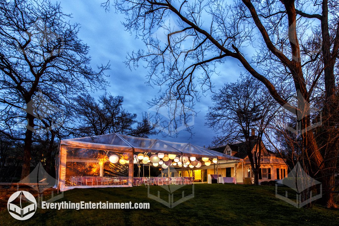 Clear top frame tent with paper lantern lights on the lawn at Alice Austen House in Staten Island by Everything Entertainment.