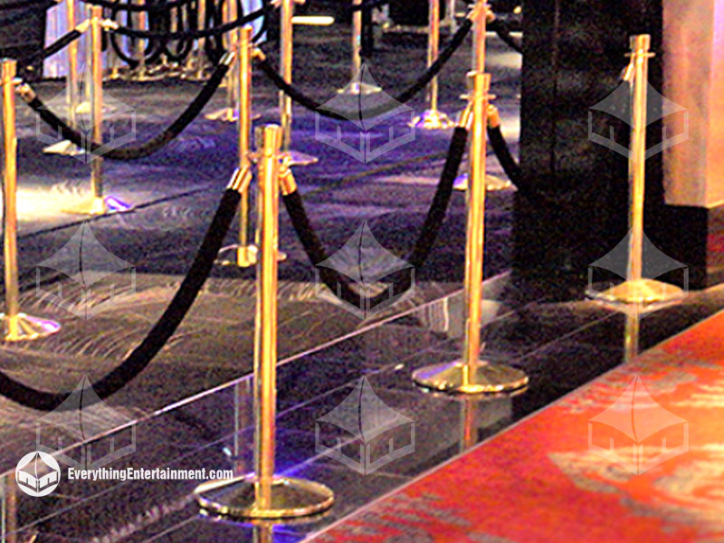 chrome-stanchion-on-grass chrome stanchions setup on grass at graduation