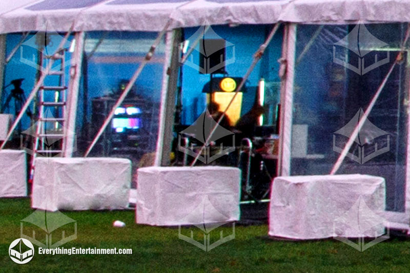 3500lb cement tent ballasts Cement Tent Anchor Ballasts connected to a large frame tent on grass