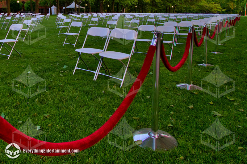 chrome-stanchion-on-grass chrome stanchions setup on grass at graduation