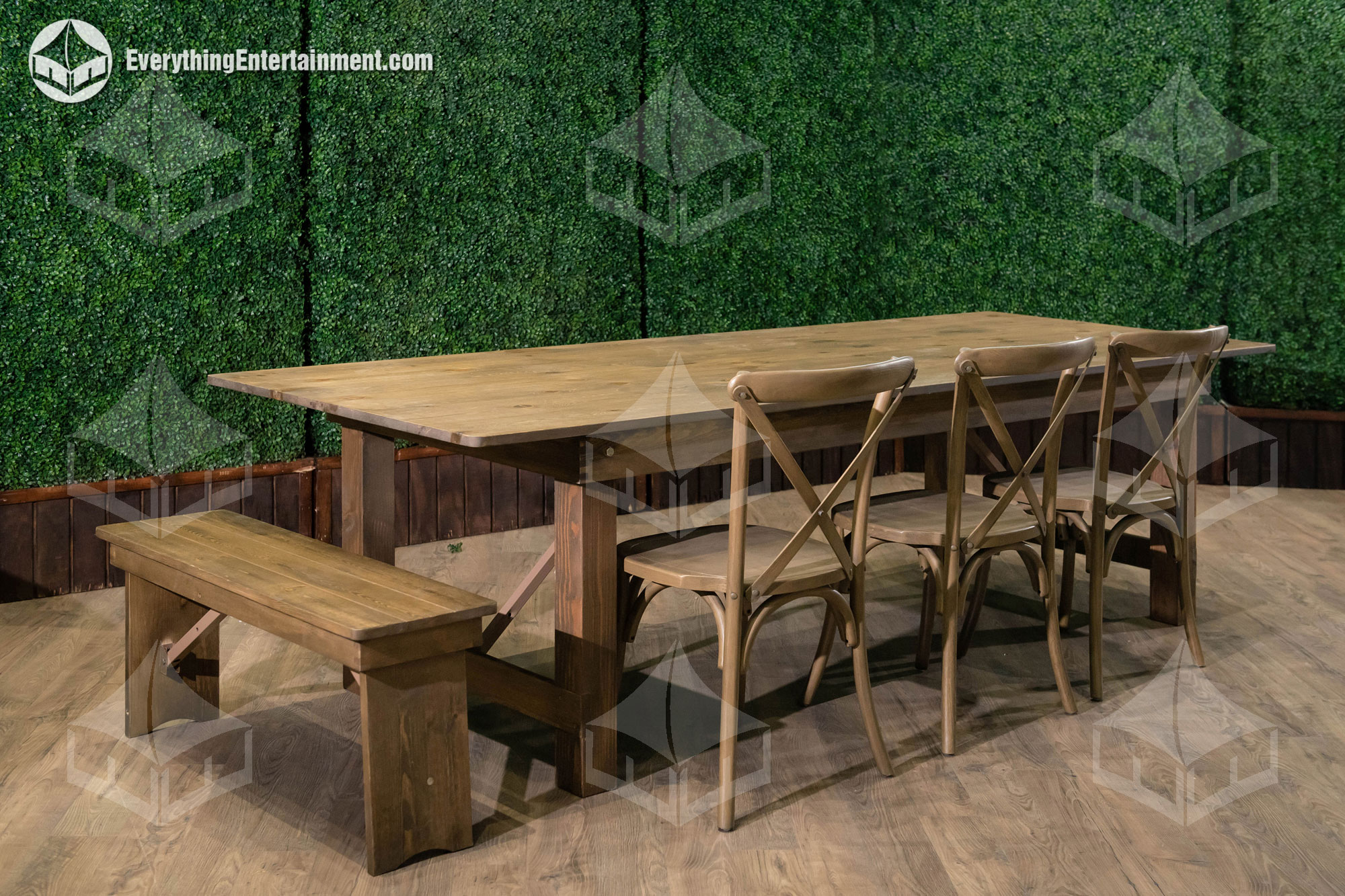 farm-table-hedge-walls Farm table with cross back chairs and hedge walls in background