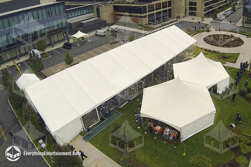 Expansive 50x190 tent and hexagon structures provide a dynamic space for large-scale corporate events.