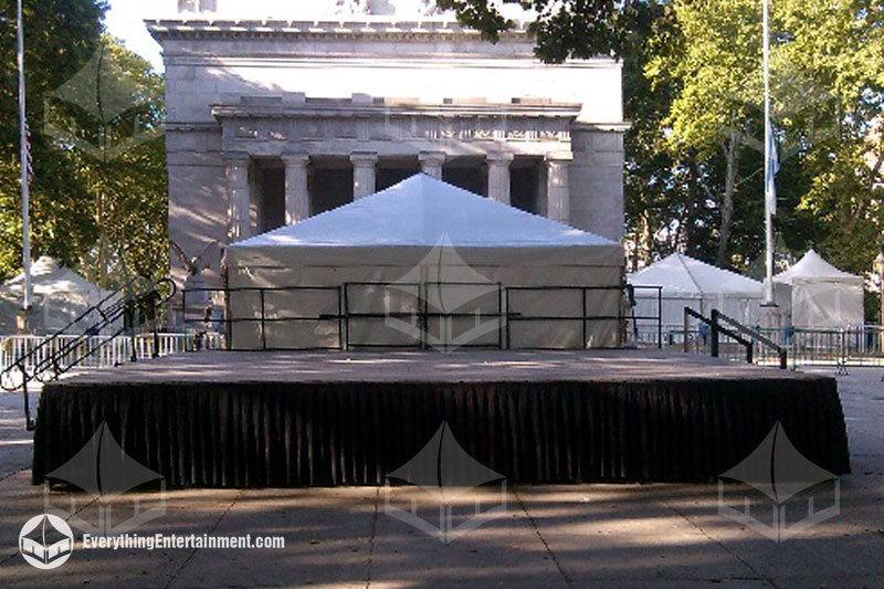 biljax-signature-stage-rental-setup-national-memor Portable BilJax Signature stage setup with black railing and skirts in front of General Grants Natio