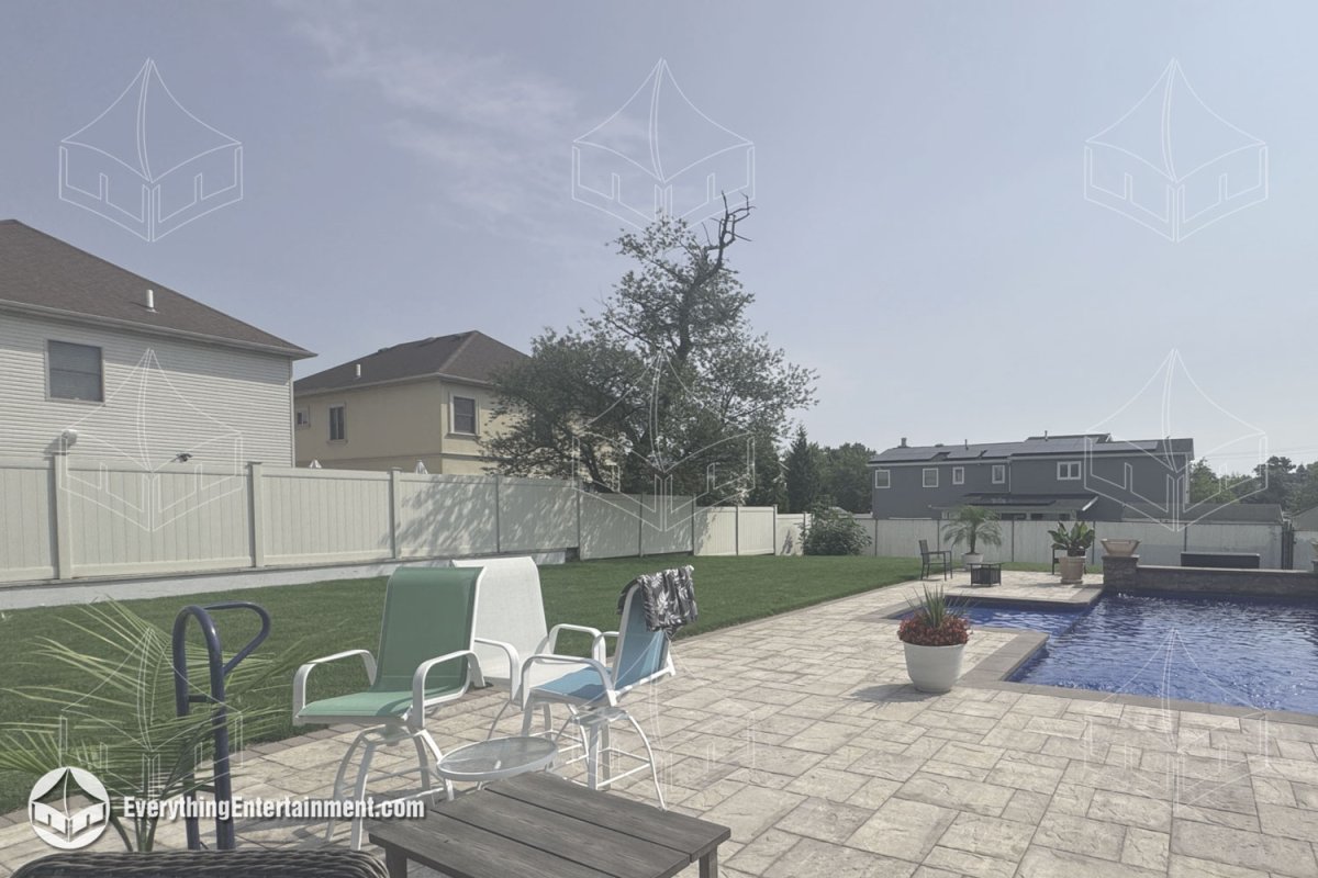 Residential backyard pool and lawn on Staten Island before tent installation by Everything Entertainment.