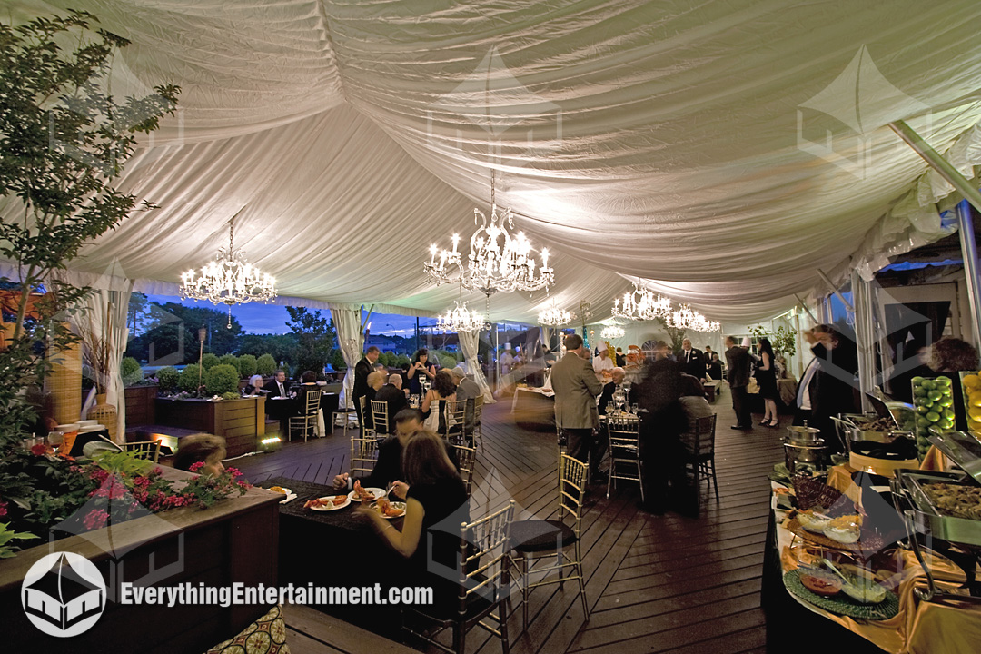 Chandeliers in tent Crystal Chandeliers hanging in a 30x60 frame tent with white fabric liner