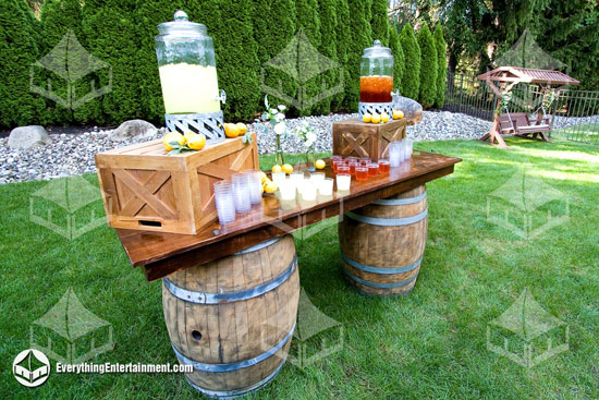 Wine Barrel Bar Table Rental Two wine barrel rentals with wooden bar top
